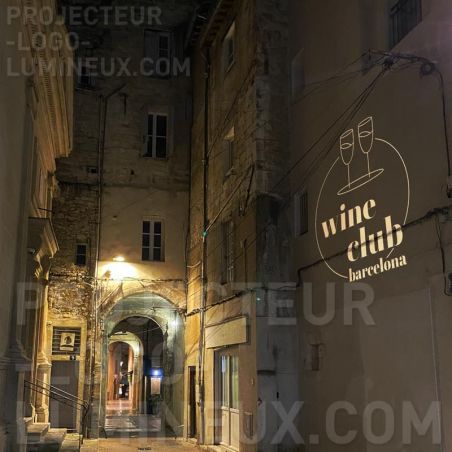 Luminous logo projection on wall for restaurant and bar